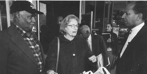 Black-and-white photo, Williams with voters