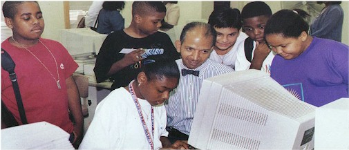 Photo: Williams with students at computer
