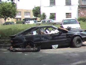 Abandoned car on Taylor Street, NW, May 21, 2001